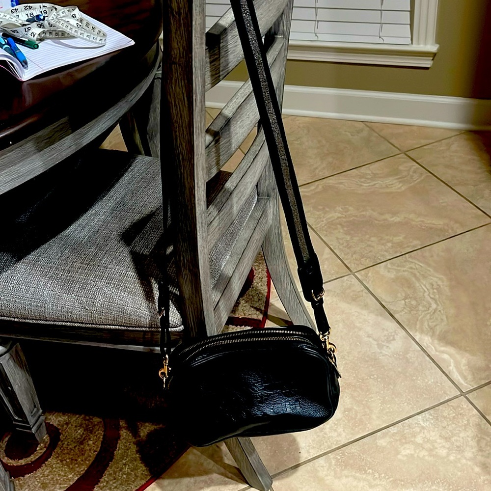 Black Coach crossbody with gold and silver